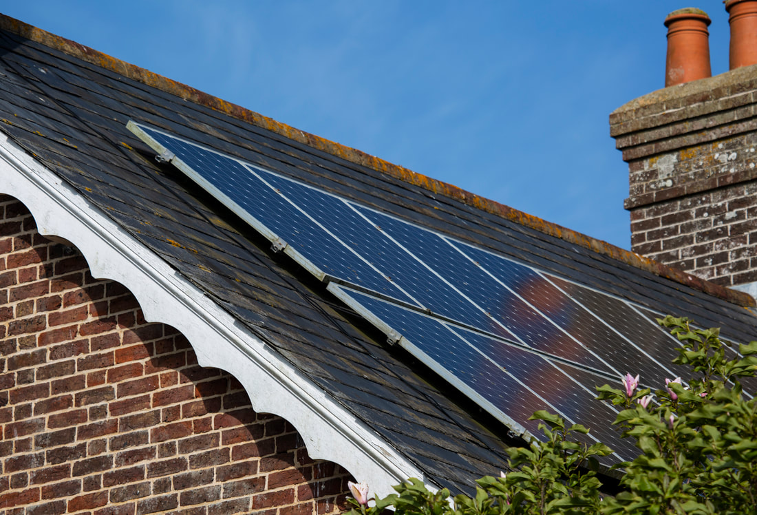 Solar panels on a roof in Chiddingly village (Image: Trevor Thomas).